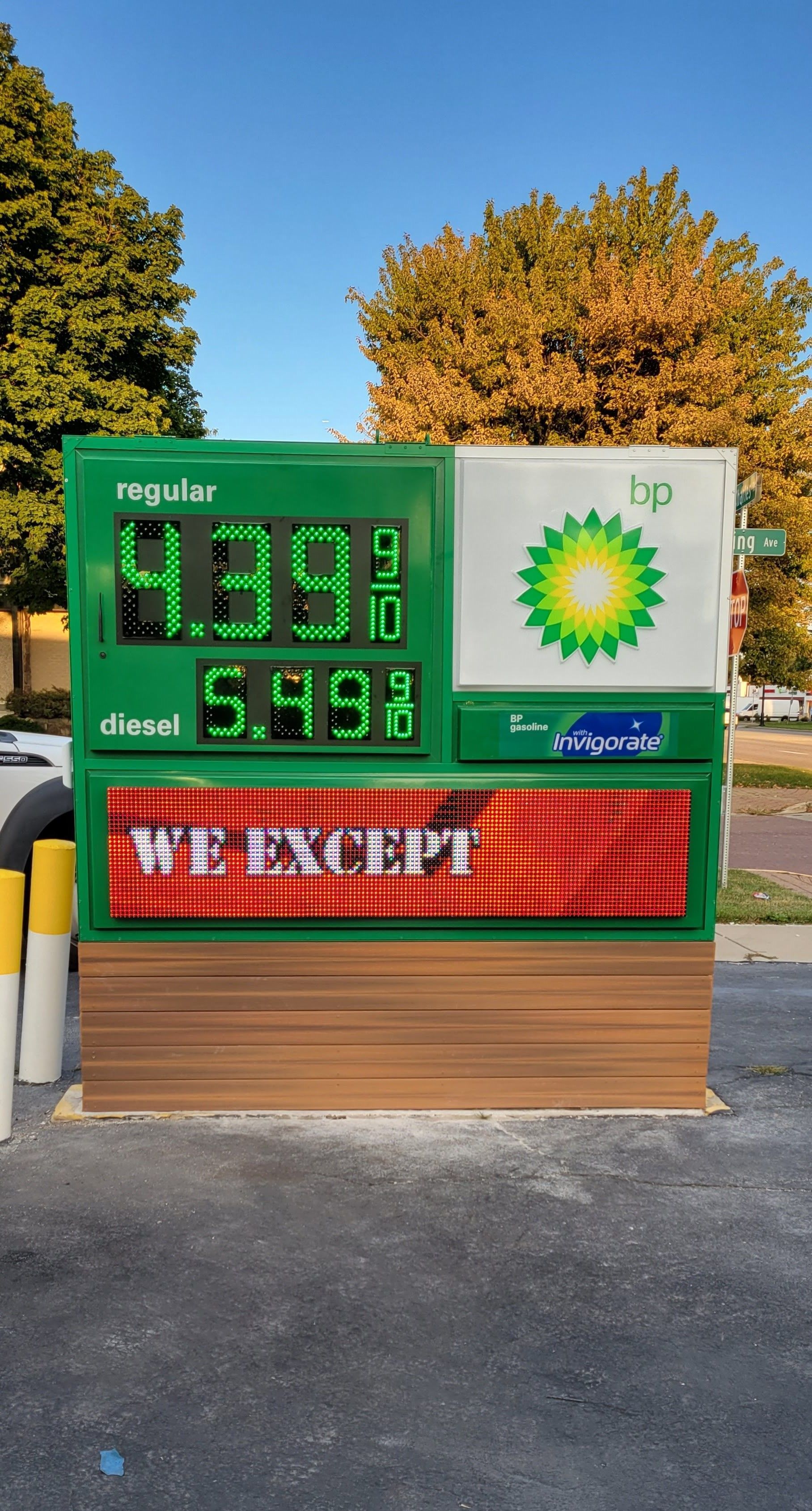 A busy city street with a sign that says once