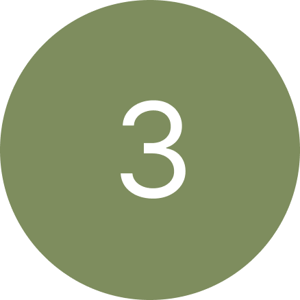 A green circle with the number three inside of it.