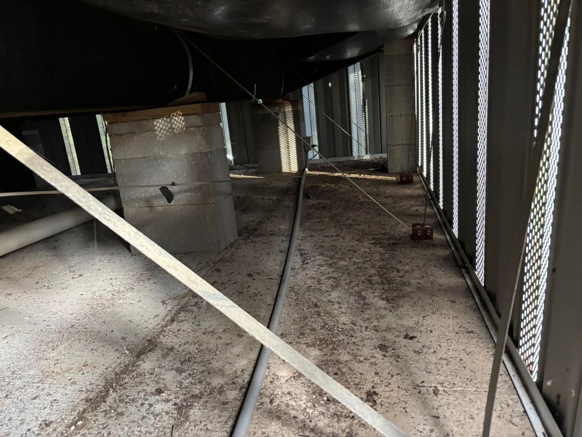 A room with a lot of wires coming out of it