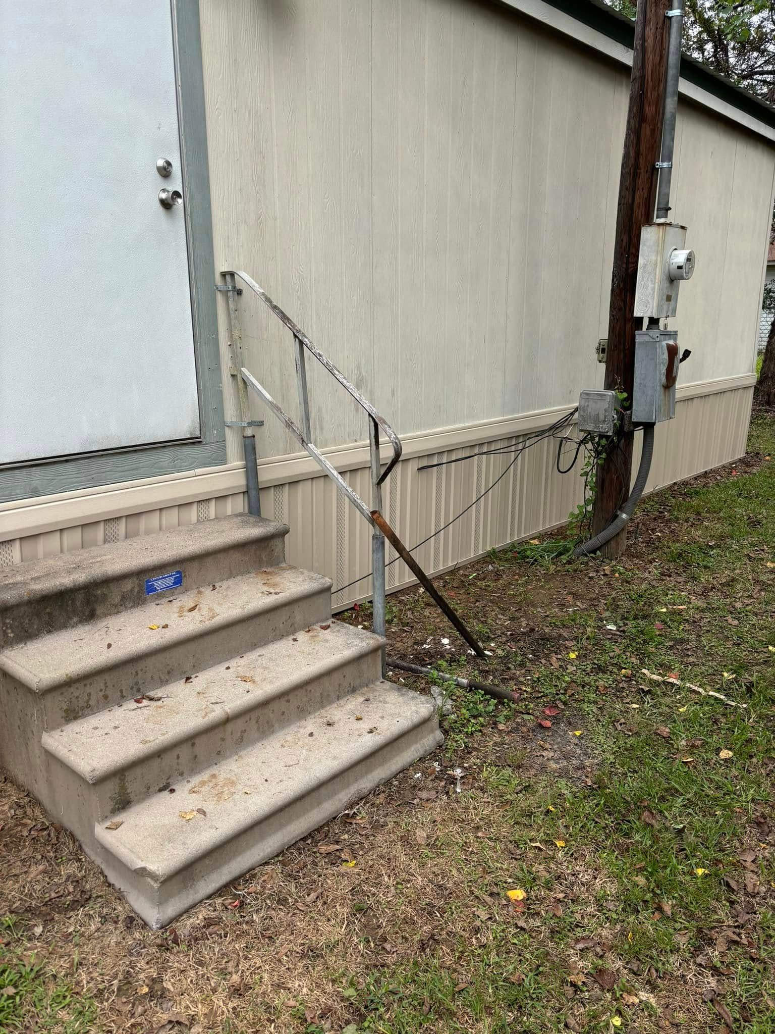 A set of stairs leading up to a mobile home.