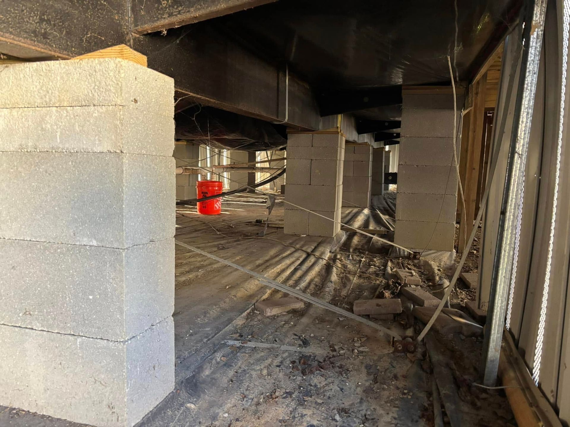 A building under construction with a lot of concrete blocks.