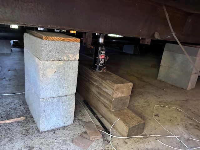 There is a chimney in the corner of the room.