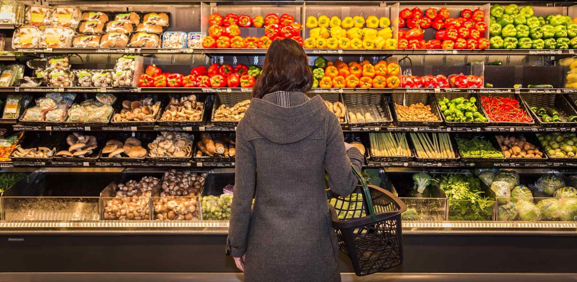 A Woman is Looking at Vegetables in a Grocery Store — Fruits & Vegetables in Maroochydore, QLD