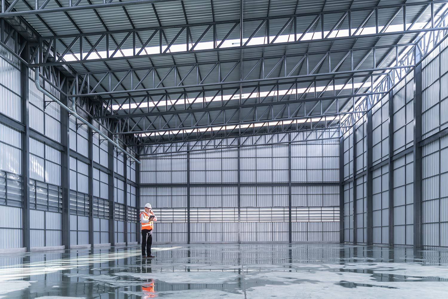 Worker Inside the Large Warehouse