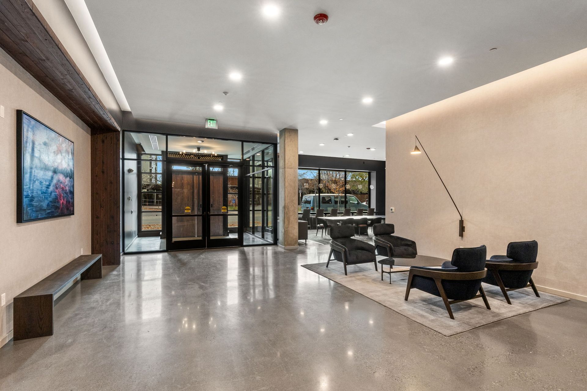 Lobby of The Ives luxury apartments in downtown Bozeman with modern seating and bright natural light