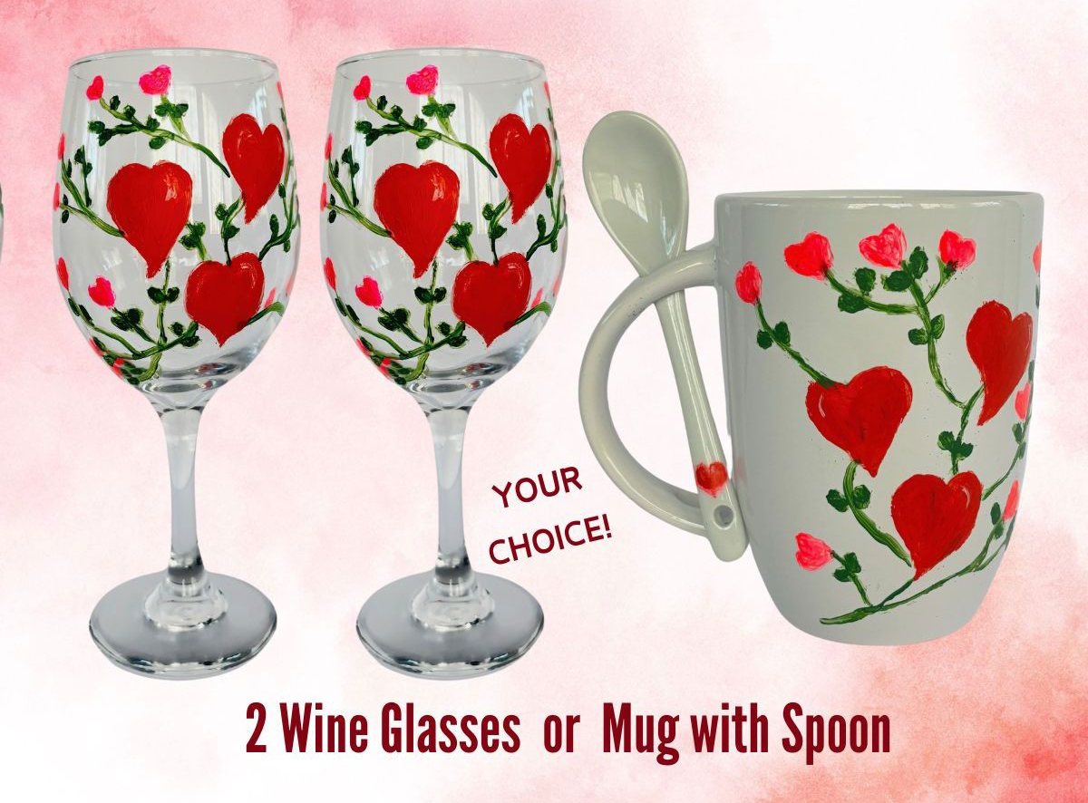 People painting at easels in a class with wine glasses and paint supplies on a table.