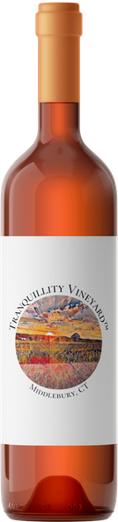 A bottle of wine with a white label and a orange cap