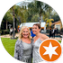 Two women are posing for a picture in a circle with a star in the middle.
