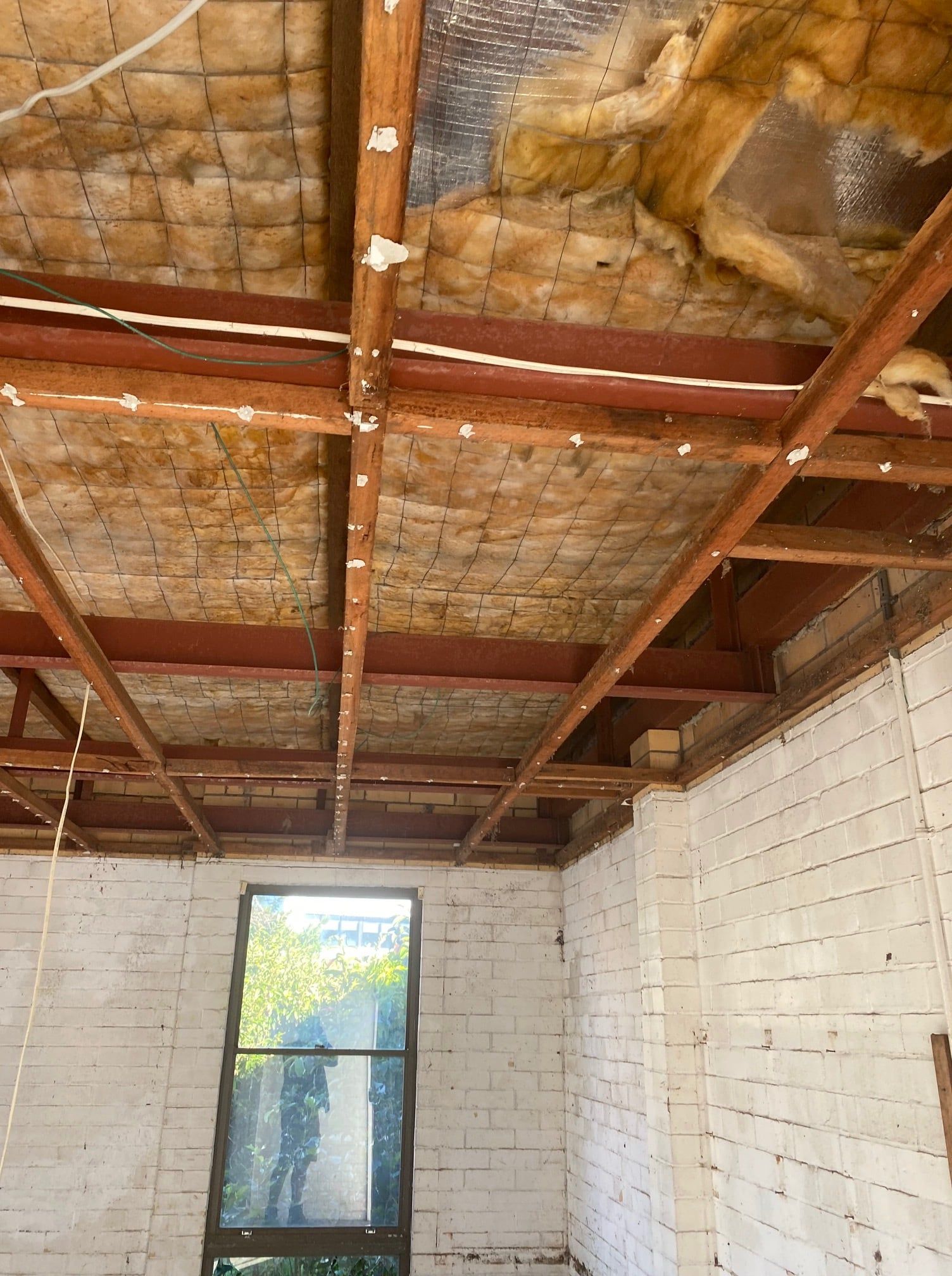 Ceiling Framing Exposed, With Insulation — On Demand Diggers and Demolitions in Gold Coast, QLD