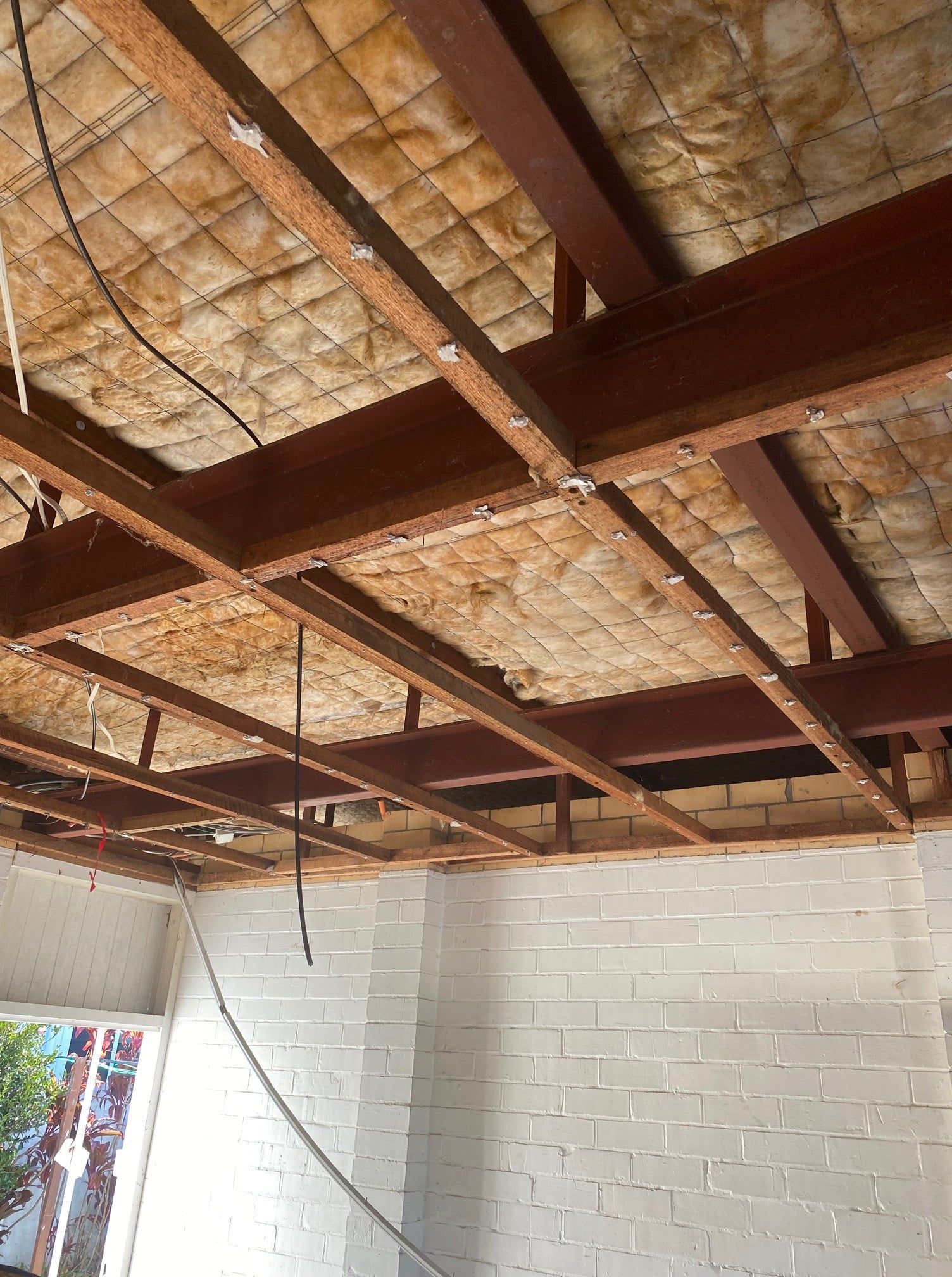 Exposed Metal Ceiling Beams With Insulation — On Demand Diggers and Demolitions in Brisbane, QLD