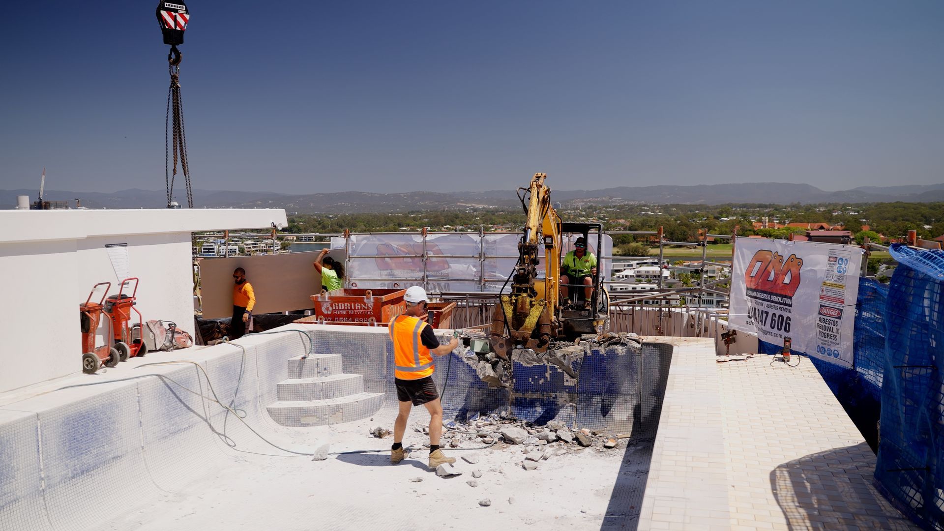 Couple of Excavators Are Sitting on Top of a Pile of Dirt — On Demand Diggers & Demolitions in Gold Coast, QLD