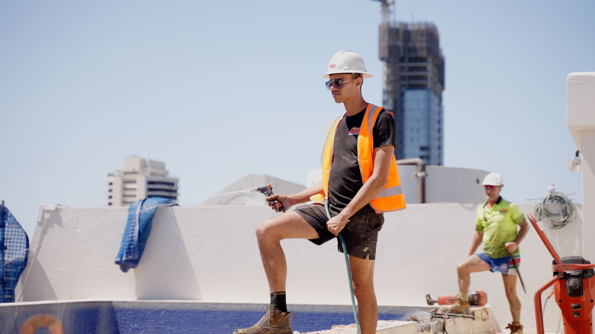 Large Excavator Bucket is Sitting on Top of a Pile of Rocks — On Demand Diggers & Demolitions in Northern, NSW