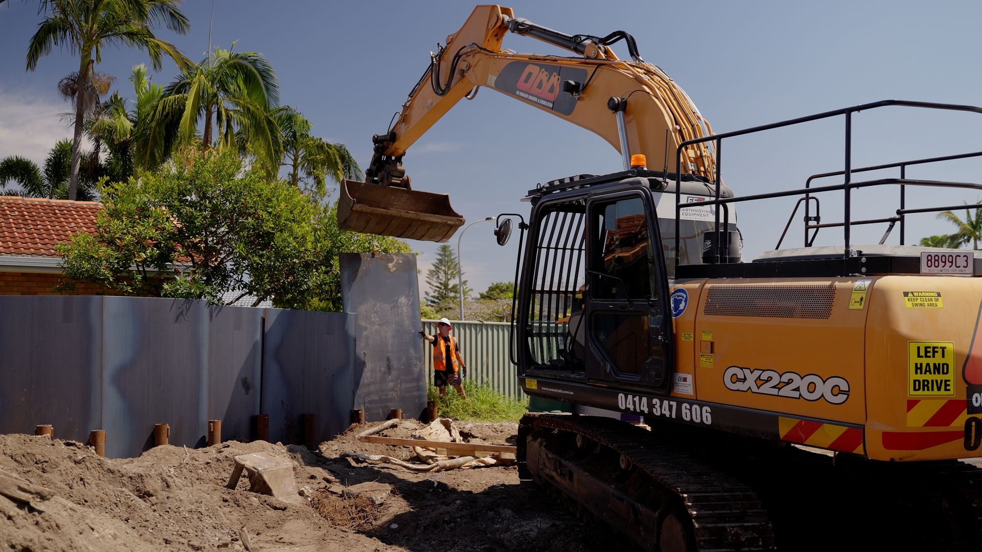 Row of Trucks Are Driving Down a Highway at Sunset — On Demand Diggers & Demolitions in Brisbane, QLD