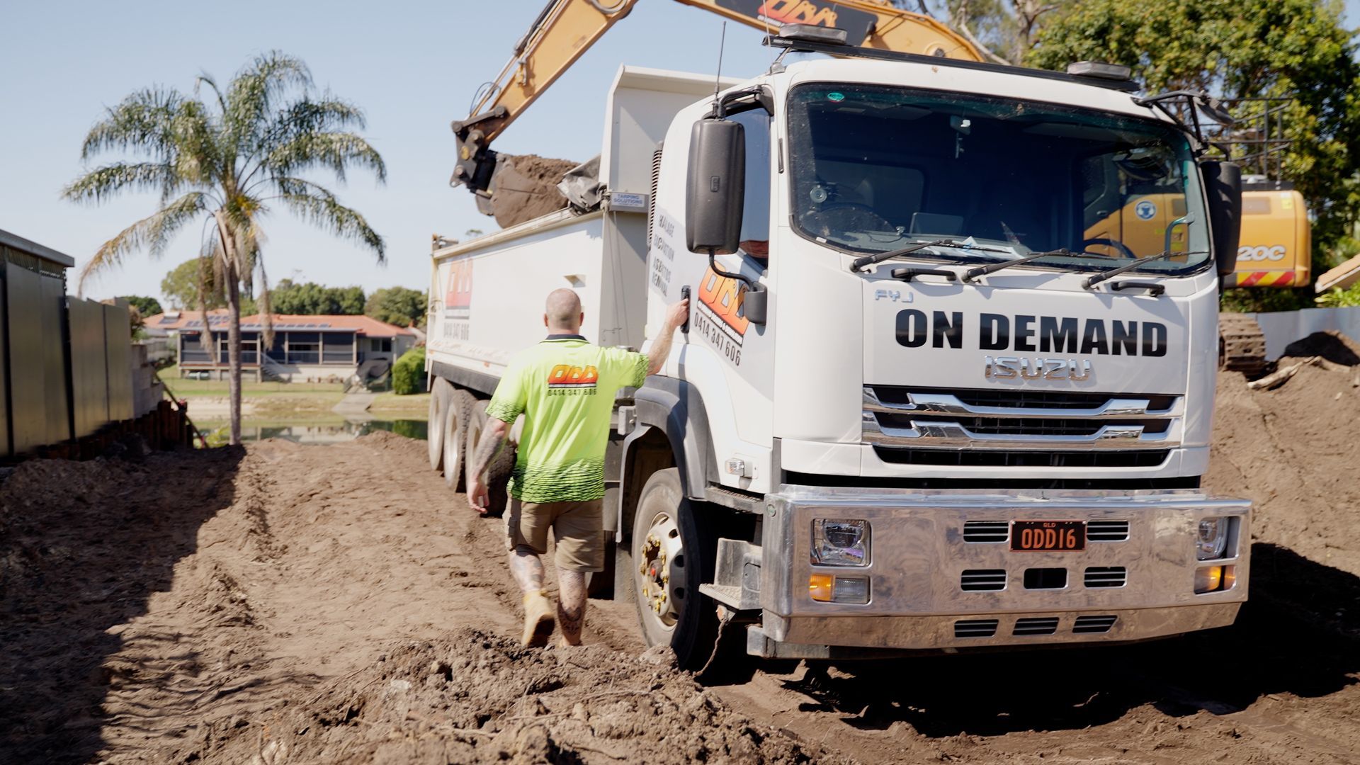 Yellow Excavator is Demolishing a Building in the Snow — On Demand Diggers & Demolitions in Gold Coast, QLD