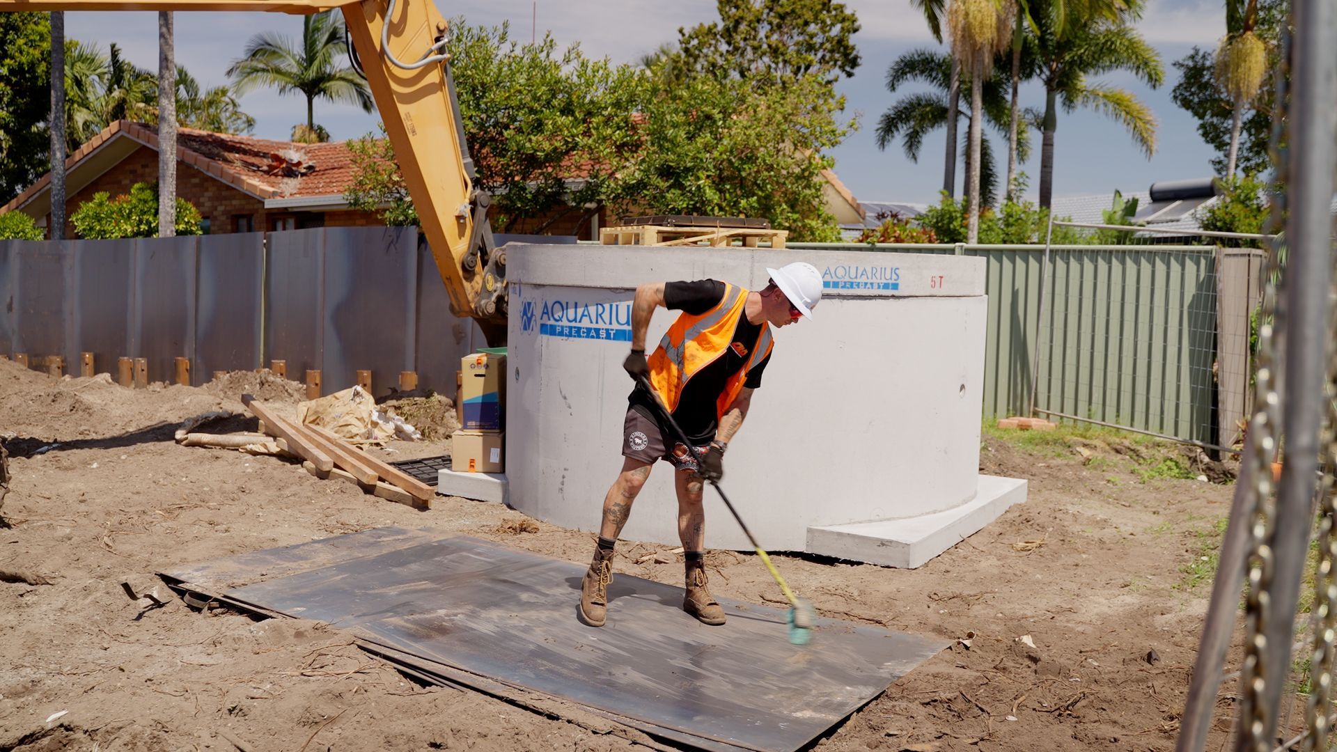 Dump Truck is Being Loaded With Dirt by a Yellow Excavator — On Demand Diggers & Demolitions in Sunshine Coast, QLD