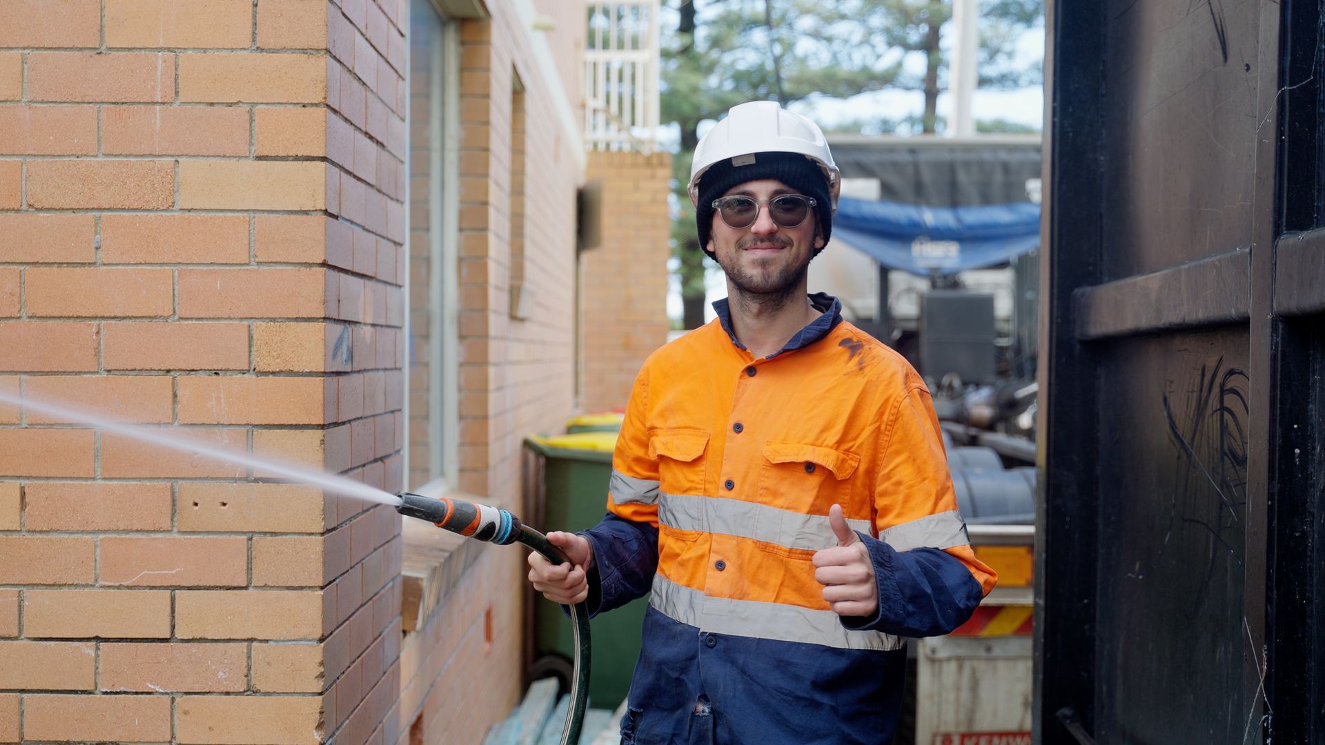 Yellow Excavator is Digging a Hole in the Ground — On Demand Diggers & Demolitions in Brisbane, QLD
