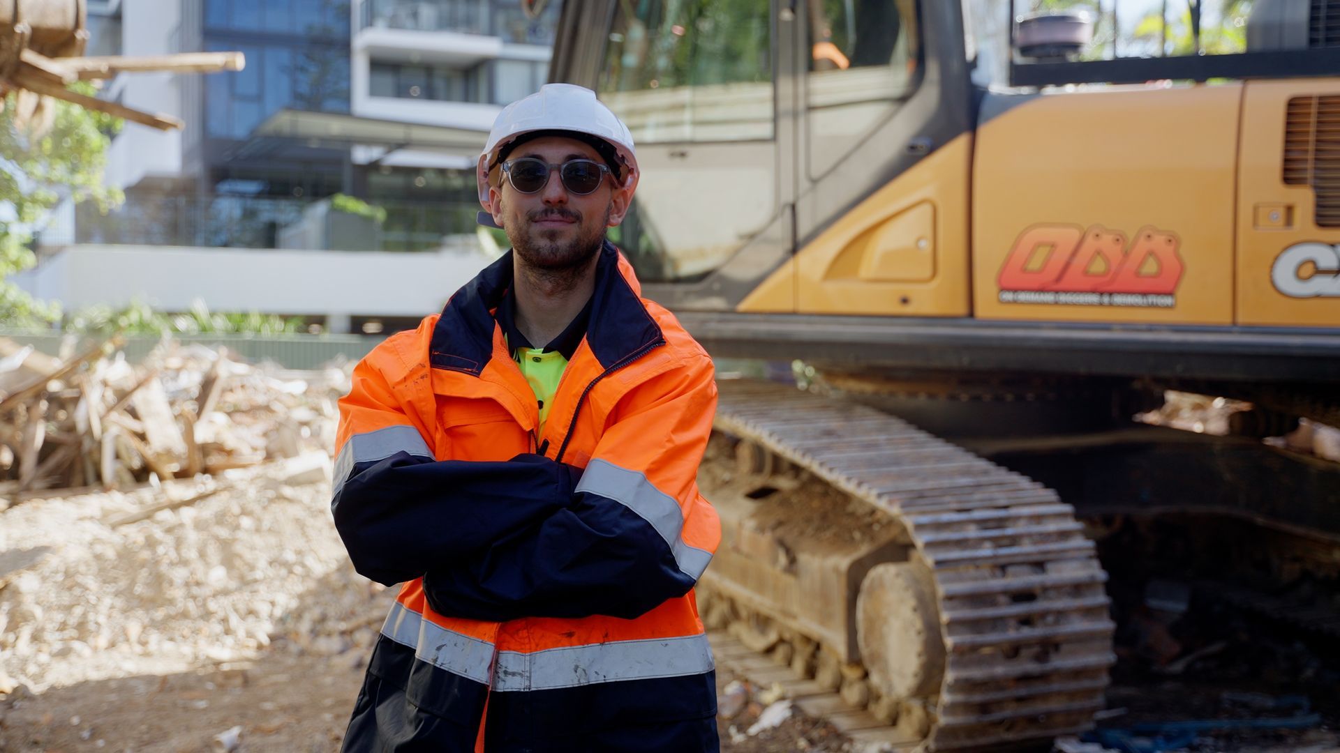 Yellow Excavator is Digging a Hole in the Ground — On Demand Diggers & Demolitions in Molendinar, QLD