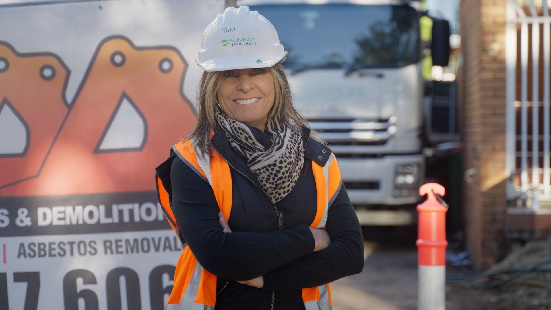 An Aerial View of a Boat in the Water With a Crane Attached to It — On Demand Diggers & Demolitions in Molendinar, QLD