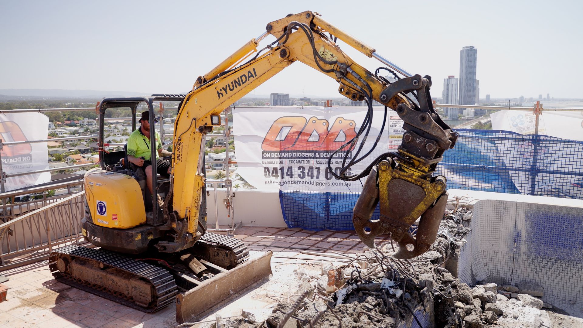 Bulldozer is Digging a Hole in the Ground — On Demand Diggers & Demolitions in Molendinar, QLD