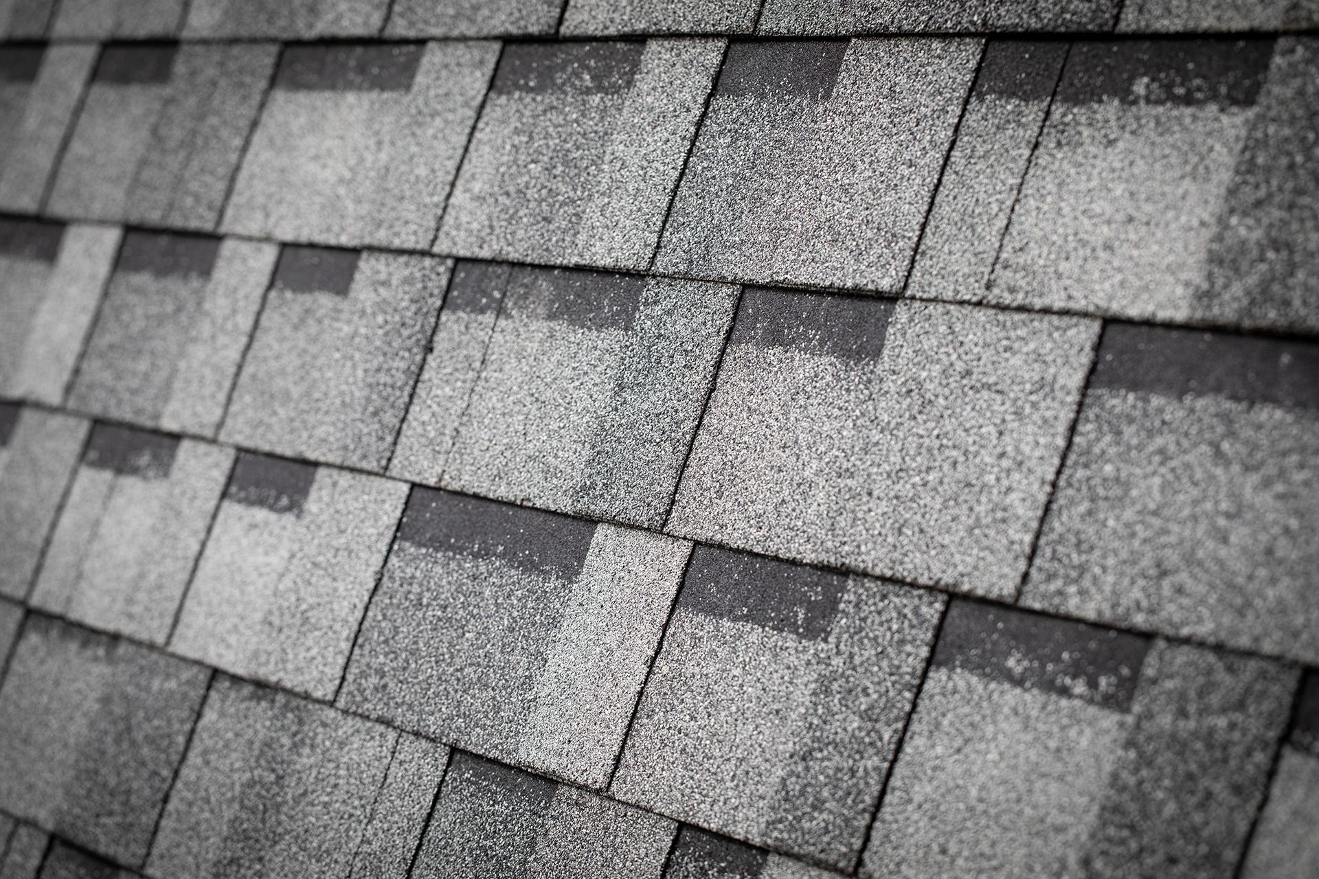 Gray asphalt roof shingles.