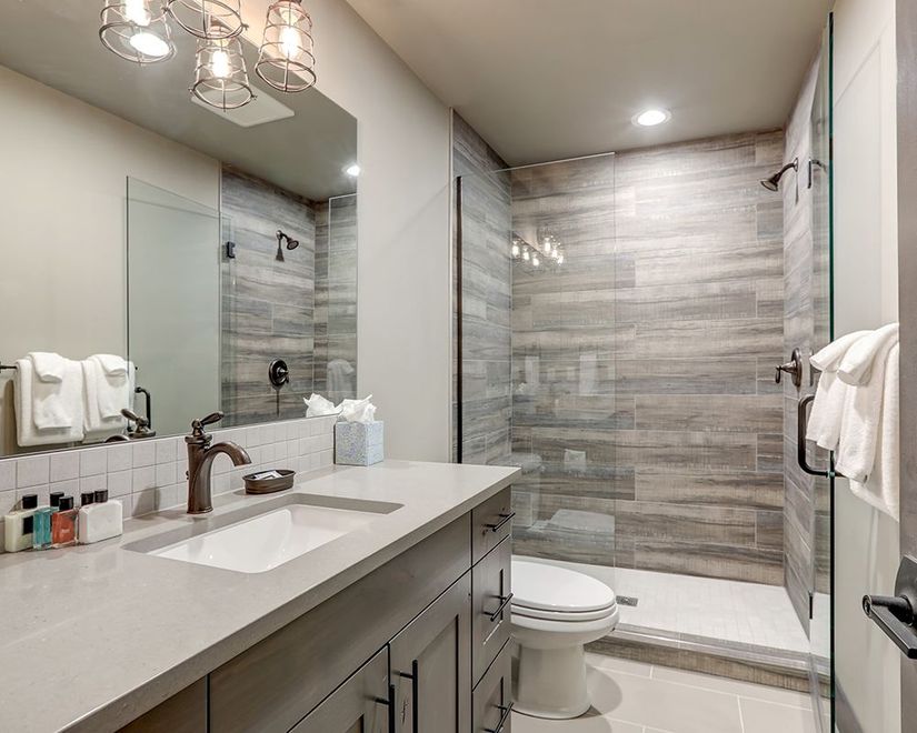 A Bathroom with a Sink And Mirror