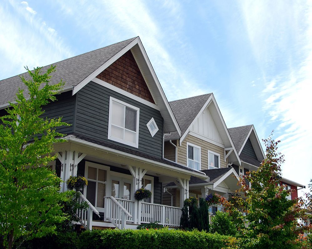 House with Tile Roof and Siding — Decatur, AL — Roman's Roofing Inc.