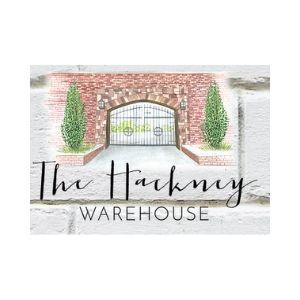 The Hawney Warehouse logo with a brick gate, iron arch, and two green trees