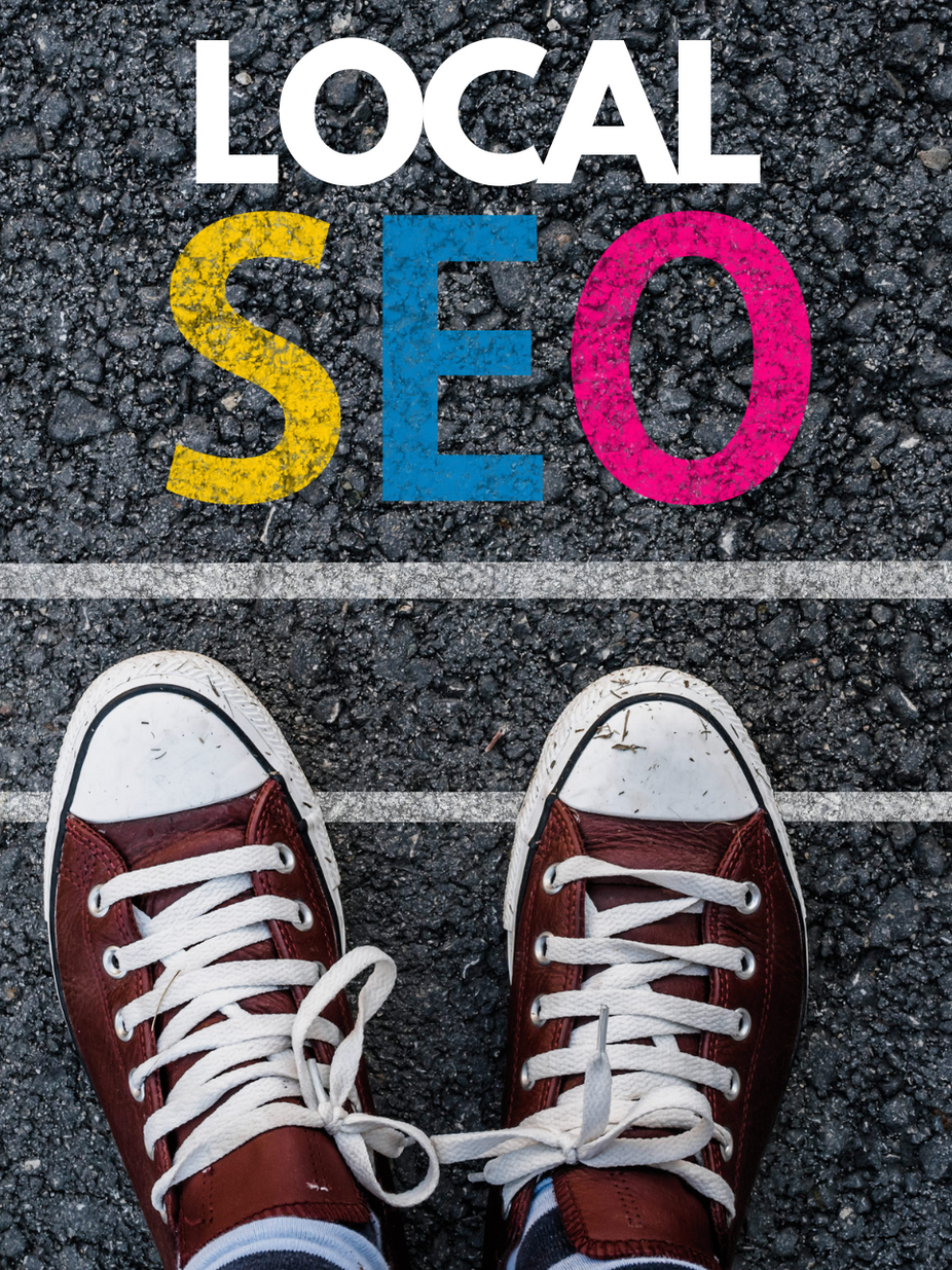 A person's feet stand next to a sign that says local seo.