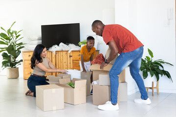 Move-in cleaning service in Lithia Springs GA - family unpacking in freshly cleaned home by Willett's Fresh Start Cleanings