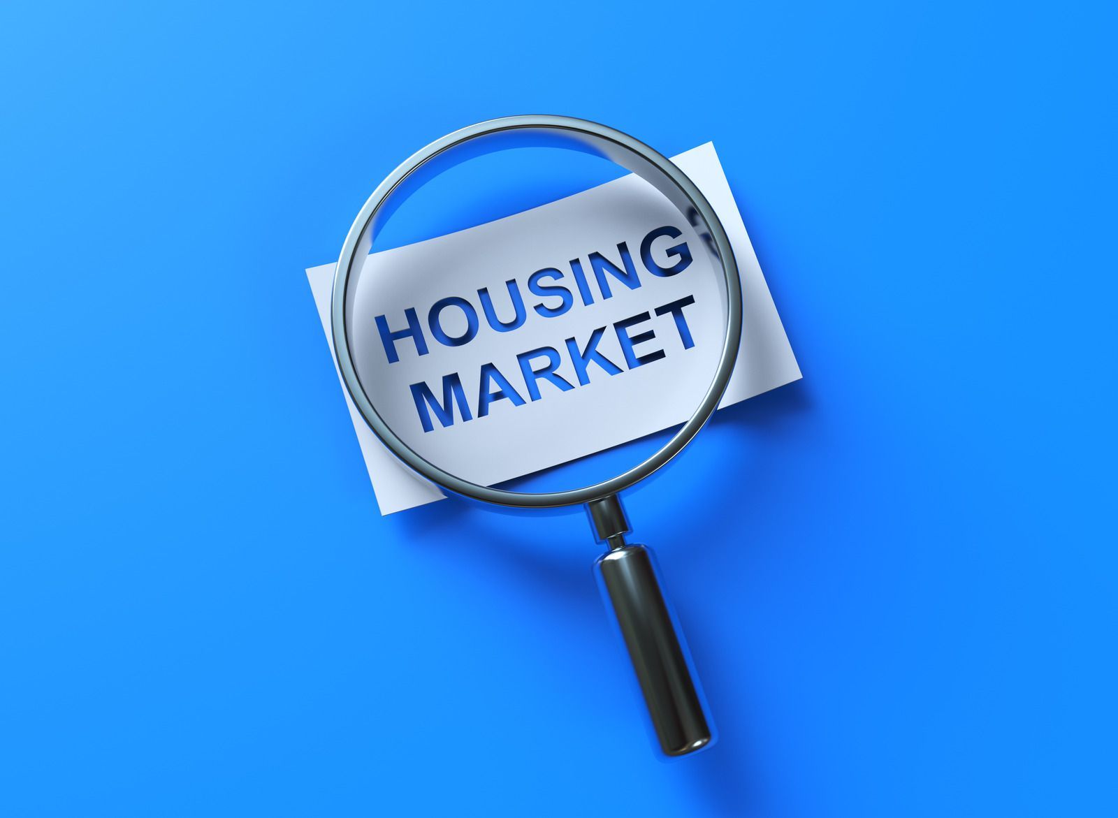 Magnifying glass over a paper reading 