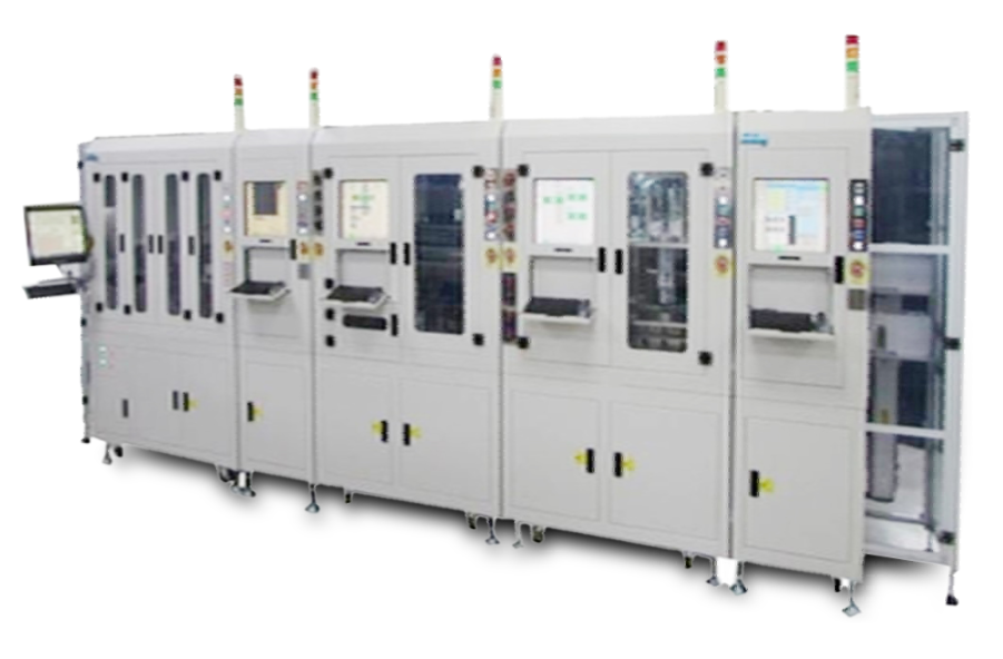 A large machine is sitting on top of a white table.