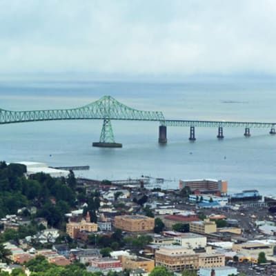 An aerial view of a bridge over a body of water