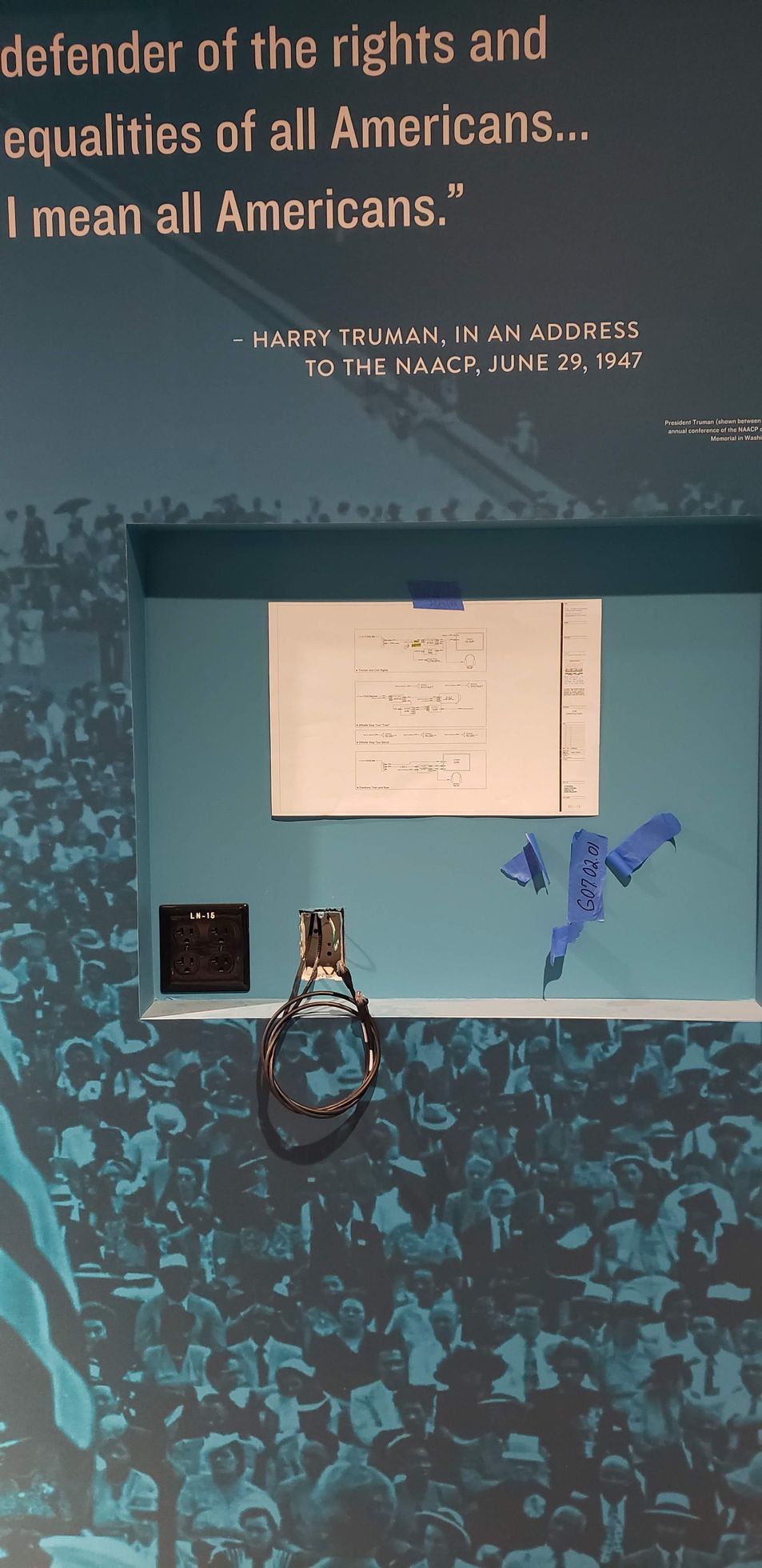 A sign on a wall that says 