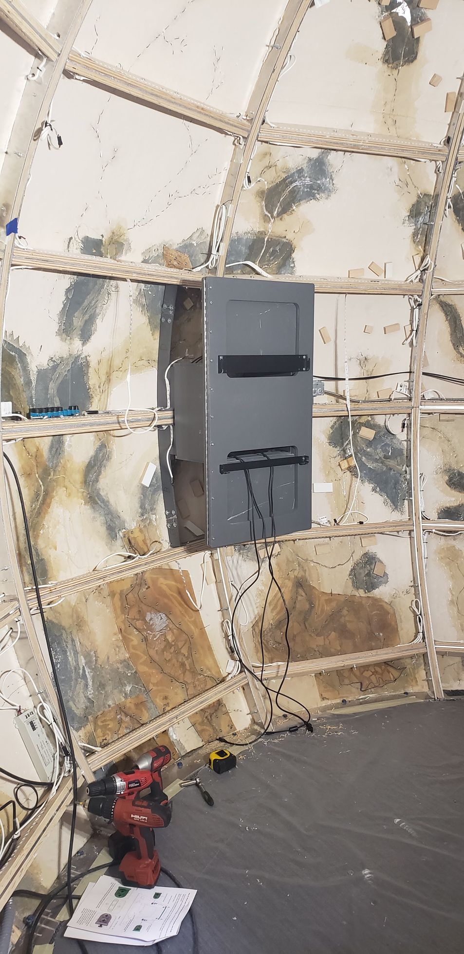 A room with a lot of walls and a door.