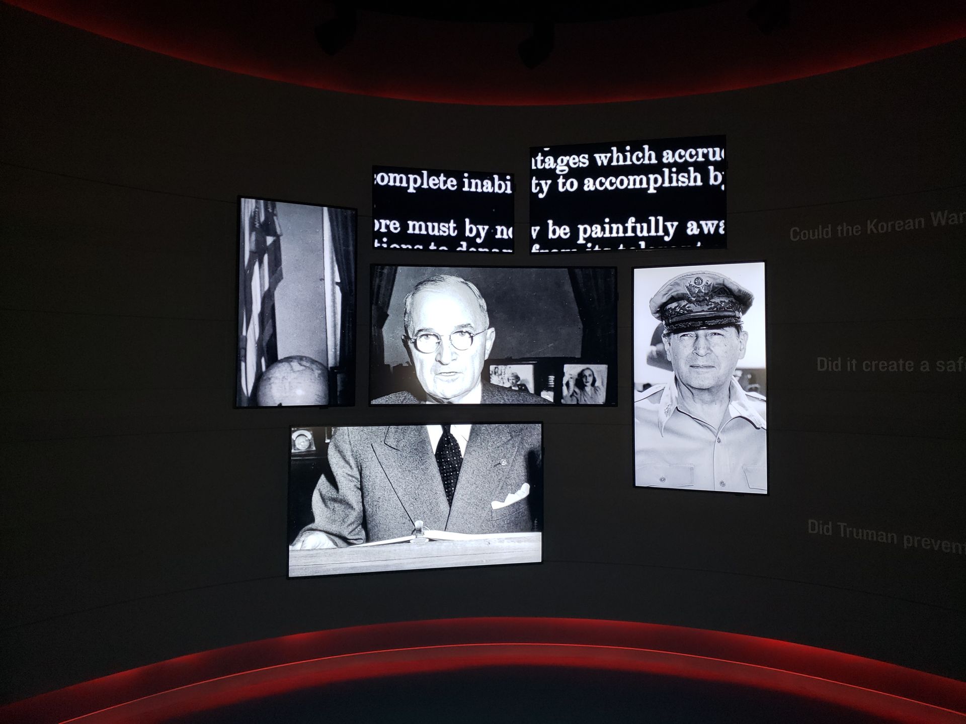 A black and white photo of a man in a suit and tie
