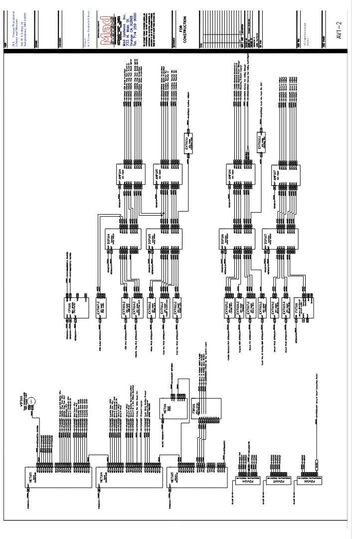 A black and white drawing of a city with a lot of buildings