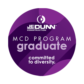A purple circle that says mcd program graduate committed to diversity