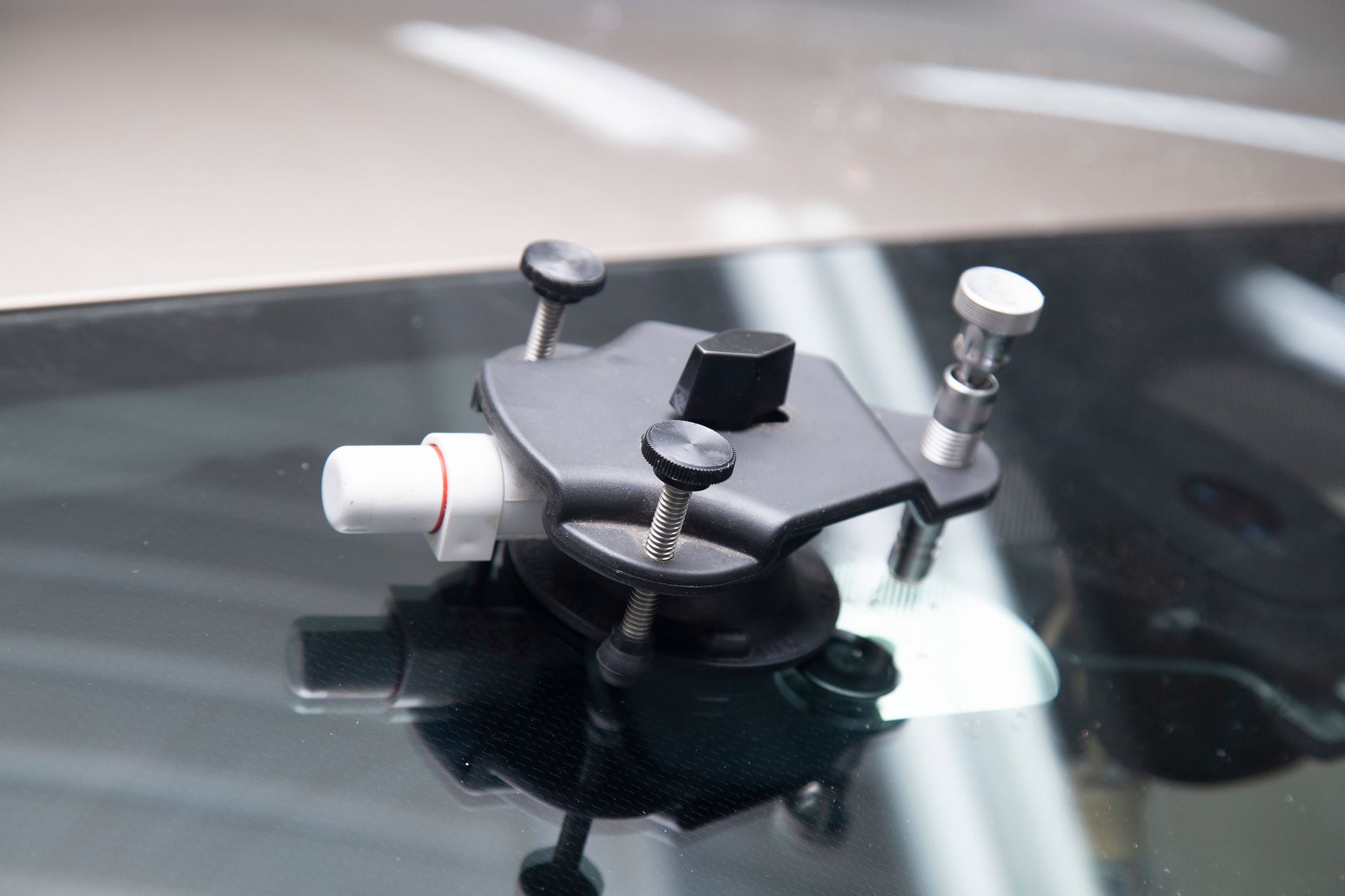 A Piece of Equipment Is Sitting on Top of A Car Windshield | Perth, WA | Perth Windscreens and Autoglass