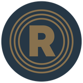 The letter Route One Logo  is in a circle on a blue background.