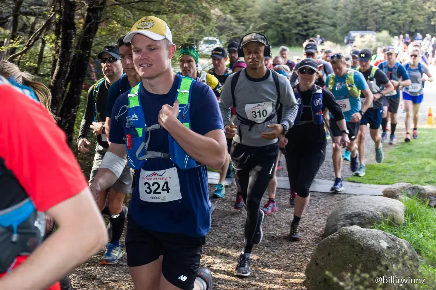 A group of people are running in a race.