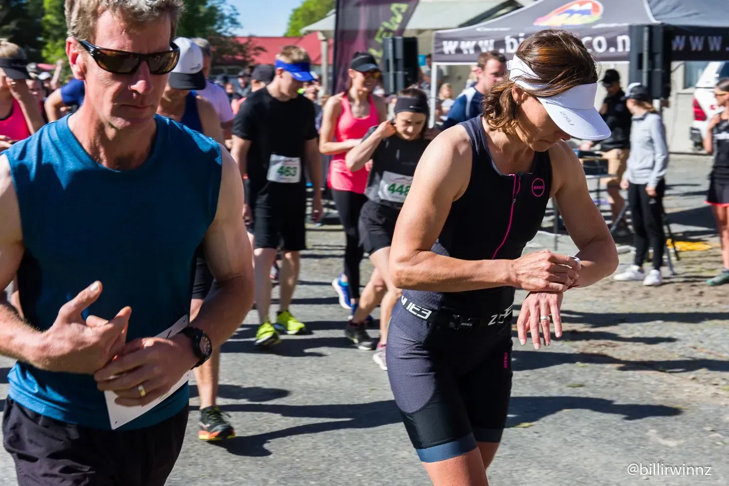 A group of people are running in a race.