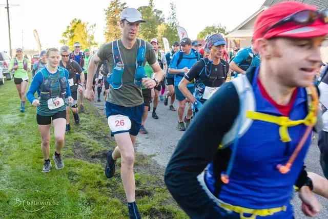 A group of people are running in a race.