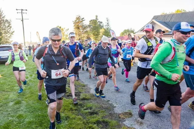 A group of people are running in a race.