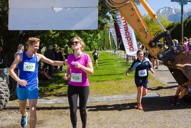 A group of people are running in a race.