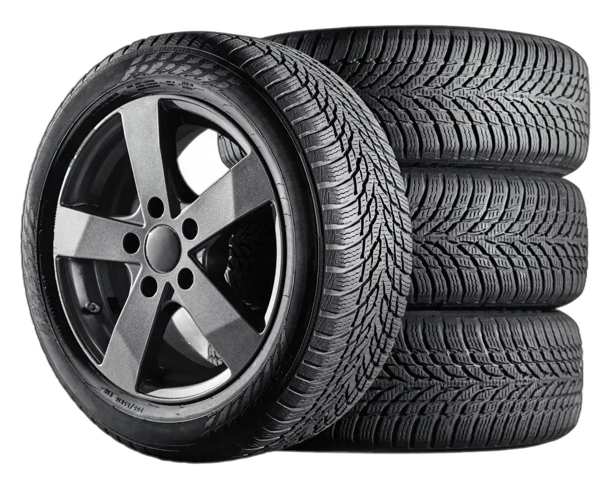 Stack of three identical black winter tires.