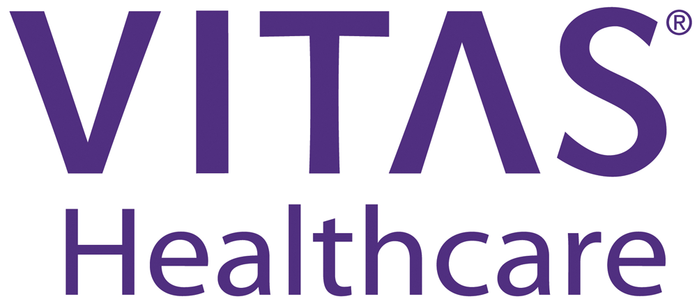The vitas healthcare logo is purple and white on a white background.
