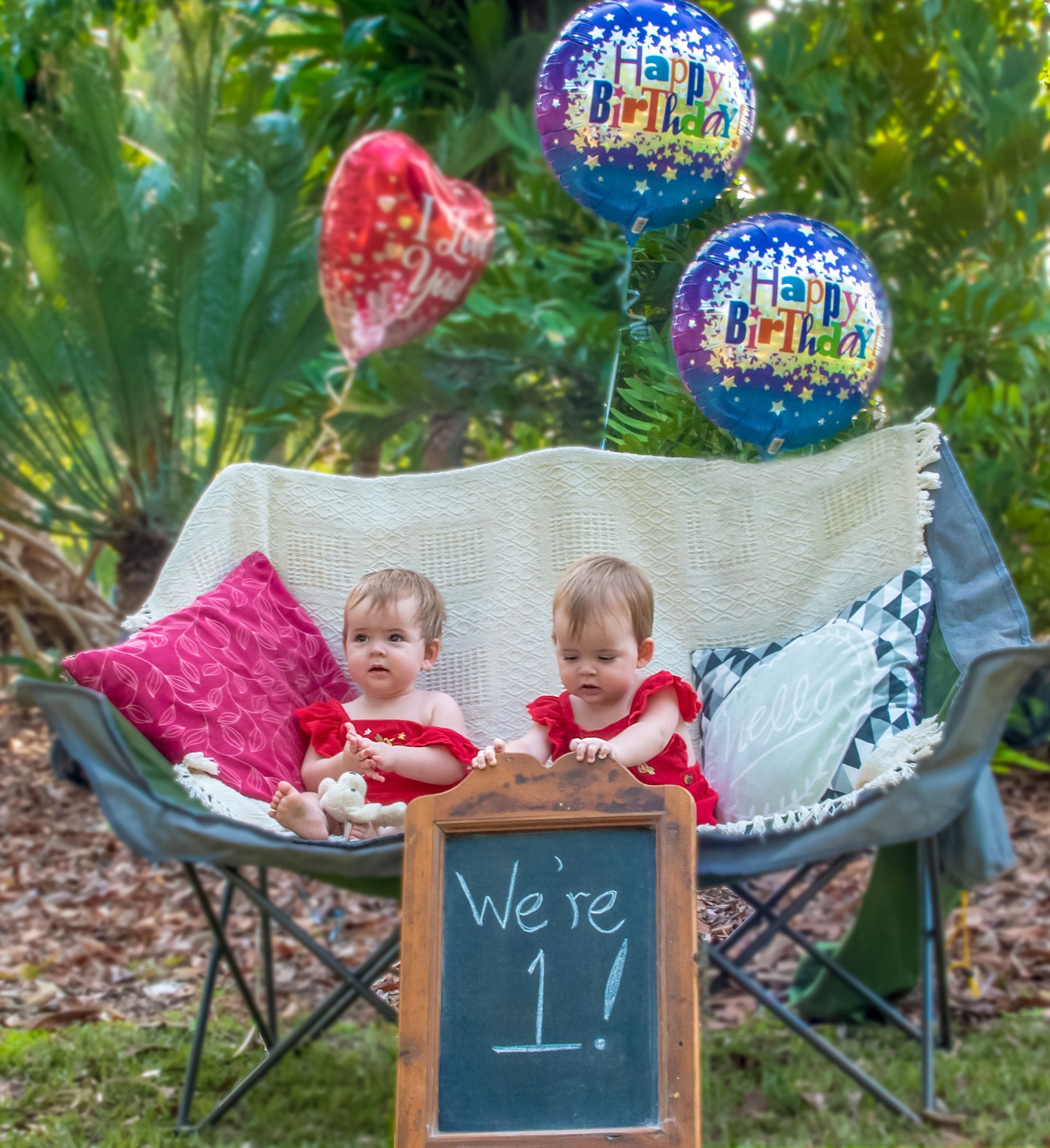 Black and White Photo of a Newborn Baby With Dark Hair — Up Here Photography in Rosebery, NT