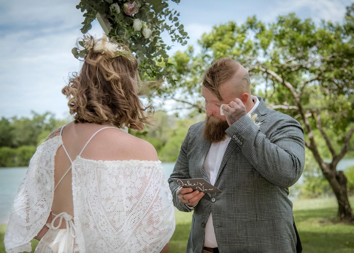 Groom Wiping Tears During Outdoor Wedding Ceremony — Up Here Photography in Rosebery, NT