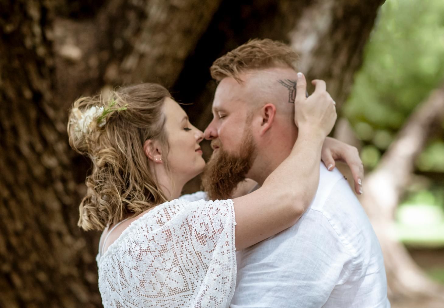 Couple Embracing Near a Tree — Up Here Photography in Rosebery, NT