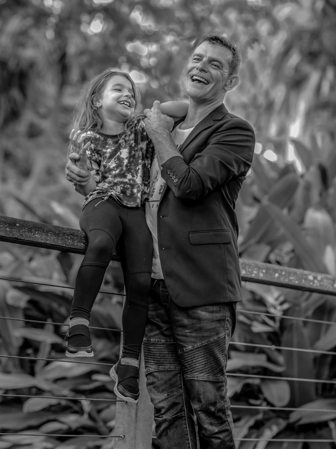 Father and Daughter Laughing — Up Here Photography in Rosebery, NT